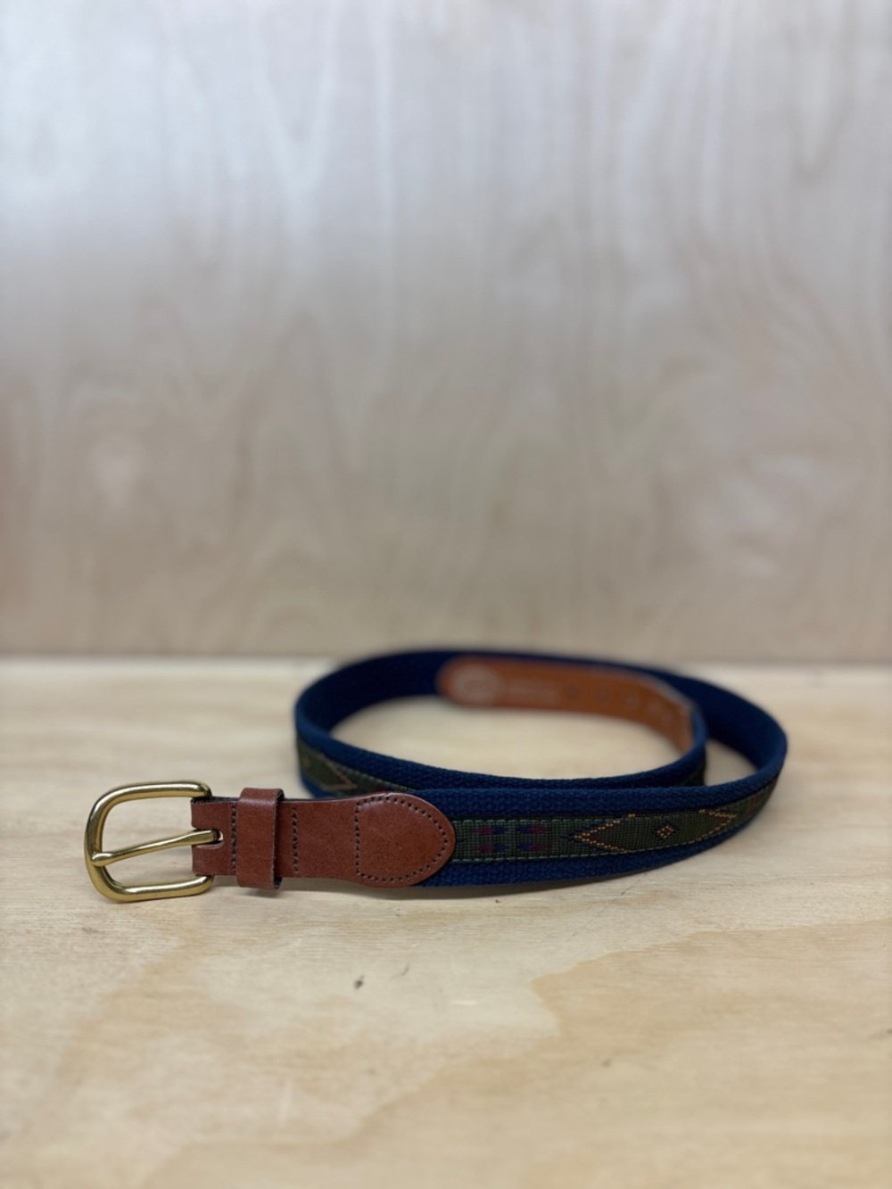 Men's Navy Webbed Belt with Green Pattern and Brown Leather Trim